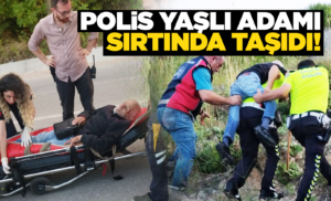 Mahsur kalan yaşlı adamı polis sırtında taşıdı