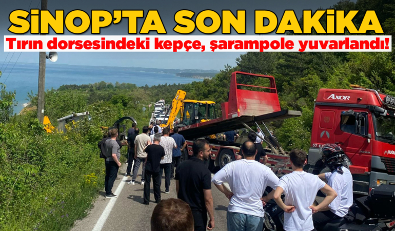 Tırın dorsesindeki kepçe şarampole devrildi