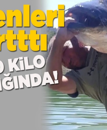 70 kilogramlık balıkla poz verdi