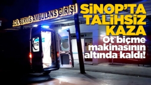 Ot biçme makinesinin altında kaldı