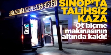 Ot biçme makinesinin altında kaldı