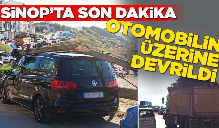 Sinop’ta elektrik direği otomobilin üzerine devrildi