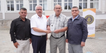 OSMAN AKSU’YA ANLAMLI PLAKET